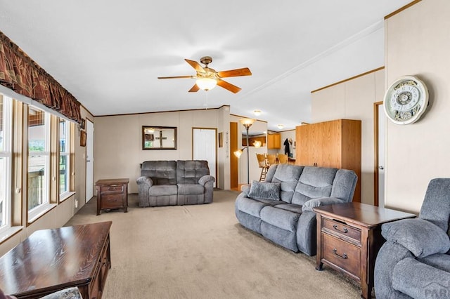 181 6th St, Penrose, CO 81240 - living area with light carpet, lofted ceiling, and ceiling fan