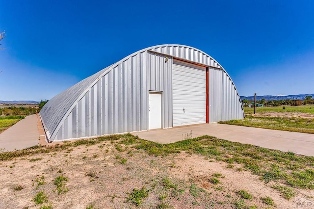 181 6th St, Penrose, CO 81240 - view of outbuilding featuring driveway and a mountain view