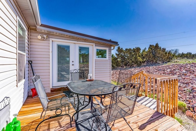 181 6th St, Penrose, CO 81240 - wooden deck featuring outdoor dining space and french doors
