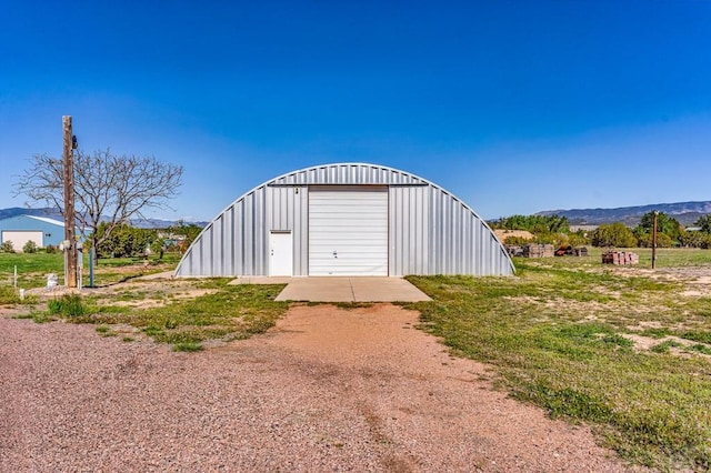 181 6th St, Penrose, CO 81240 - view of outbuilding with driveway and a mountain view