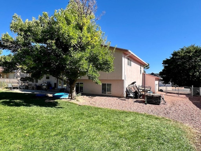 exterior space with a patio area and fence