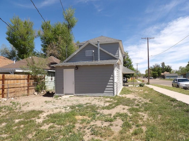 garage featuring fence