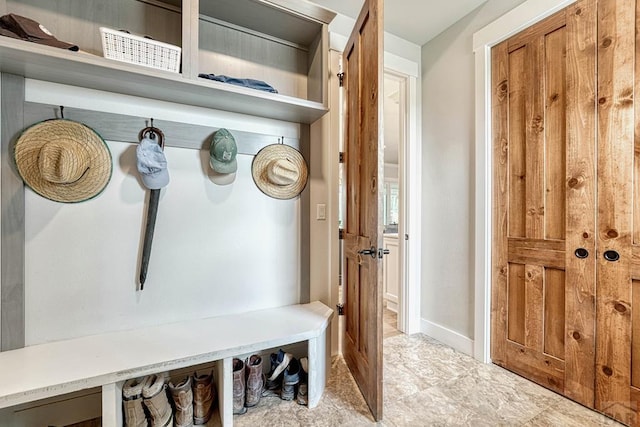 mudroom featuring baseboards