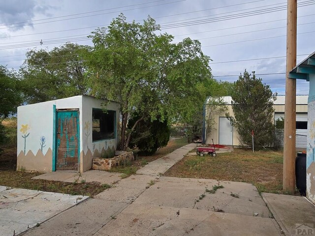 exterior space featuring an outbuilding