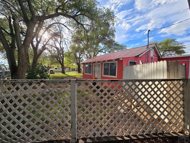 view of gate featuring fence