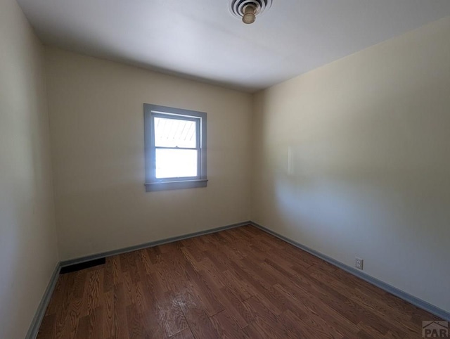 422 Grove Ave, Las Animas, CO 81054 - empty room featuring wood finished floors and baseboards