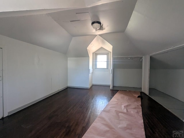 422 Grove Ave, Las Animas, CO 81054 - bonus room featuring dark wood finished floors and vaulted ceiling