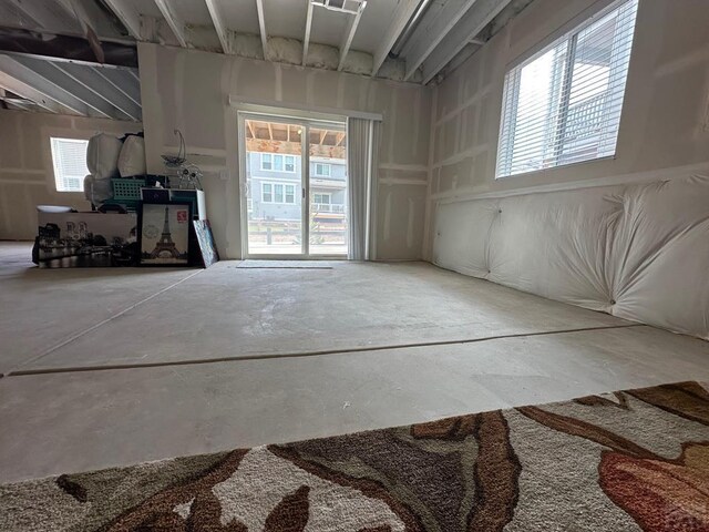 interior space with concrete floors and a wealth of natural light