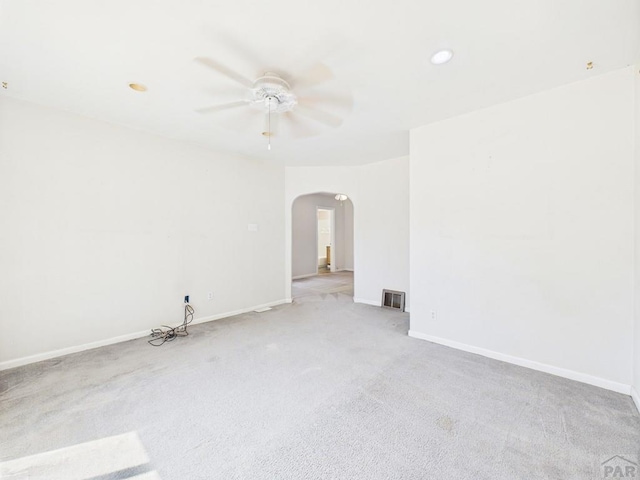 705 Euclid Ave, Pueblo, CO 81004 - carpeted spare room featuring arched walkways, ceiling fan, and recessed lighting
