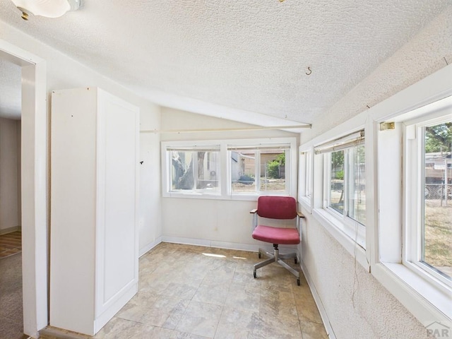 705 Euclid Ave, Pueblo, CO 81004 - unfurnished sunroom featuring lofted ceiling