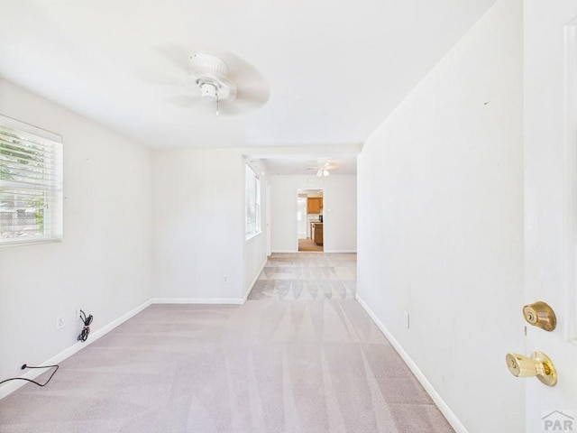 705 Euclid Ave, Pueblo, CO 81004 - spare room with a ceiling fan and carpet floors