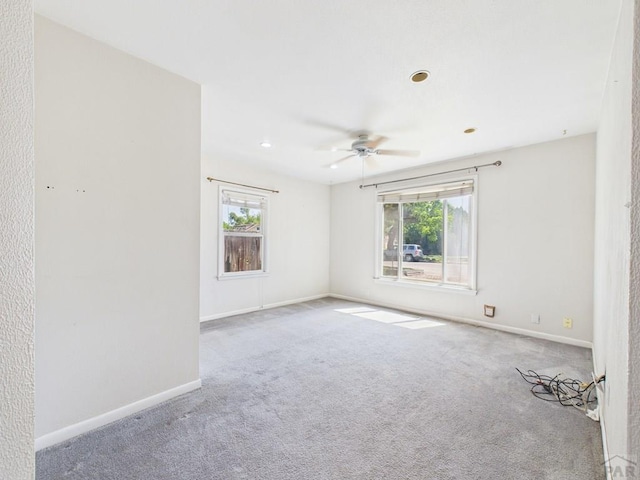 705 Euclid Ave, Pueblo, CO 81004 - carpeted spare room with healthy amount of natural light, ceiling fan, and recessed lighting