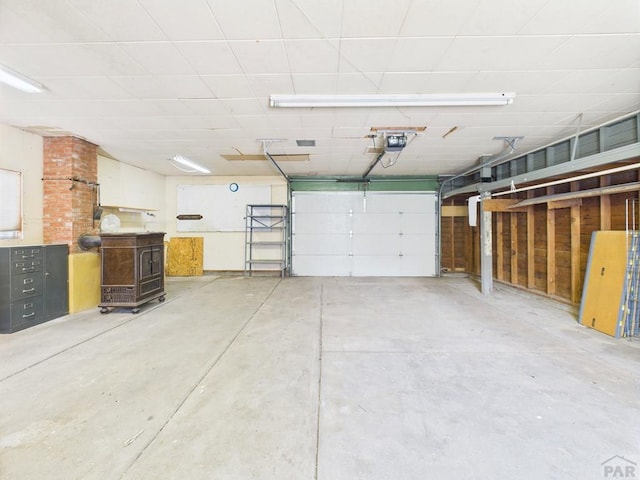 705 Euclid Ave, Pueblo, CO 81004 - garage featuring a garage door opener