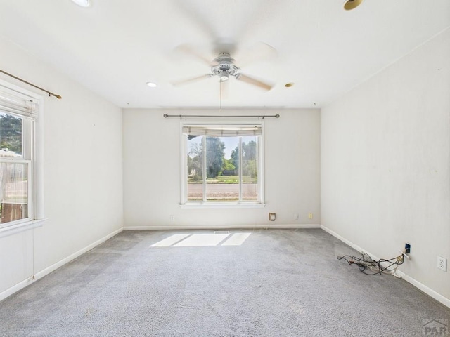 705 Euclid Ave, Pueblo, CO 81004 - carpeted empty room with healthy amount of natural light, ceiling fan, and recessed lighting