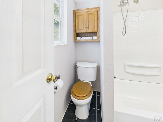 705 Euclid Ave, Pueblo, CO 81004 - bathroom featuring shower / bathtub combination and tile patterned floors