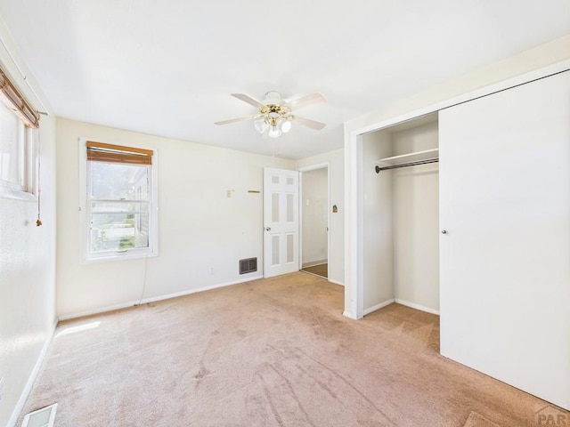 705 Euclid Ave, Pueblo, CO 81004 - unfurnished bedroom with carpet floors, a closet, and ceiling fan