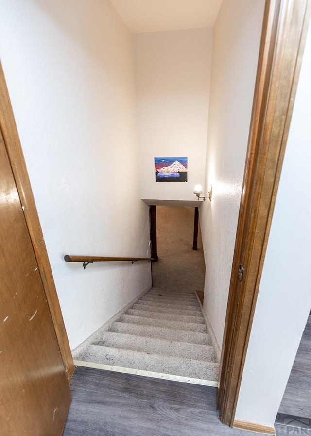 11210 Eggar Dr, Peyton, CO 80831 - staircase with wood finished floors