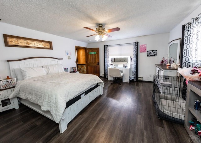 11210 Eggar Dr, Peyton, CO 80831 - bedroom with multiple windows, a textured ceiling, ceiling fan, and dark wood finished floors