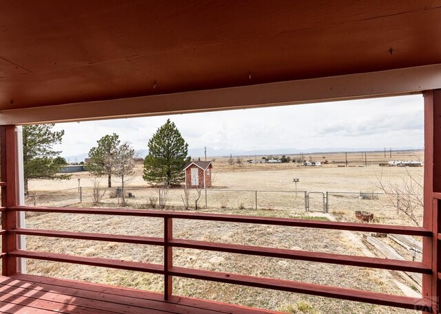 11210 Eggar Dr, Peyton, CO 80831 - wooden terrace with fence and a rural view