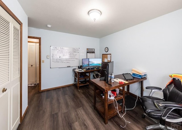 11210 Eggar Dr, Peyton, CO 80831 - home office featuring baseboards and wood finished floors