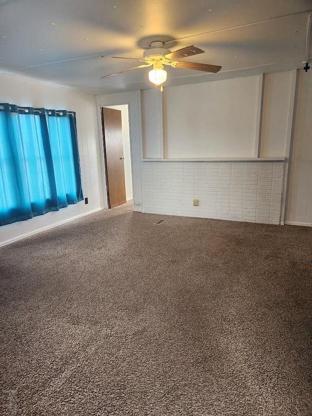 5000 Red Creek Springs Rd Unit 33, Pueblo, CO 81005 - empty room with a ceiling fan and carpet