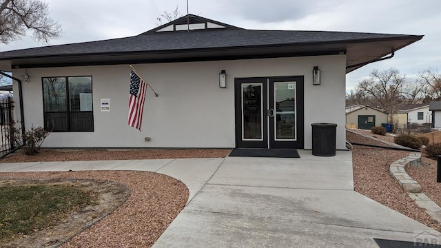 5000 Red Creek Springs Rd Unit 33, Pueblo, CO 81005 - entrance to property with roof with shingles and stucco siding