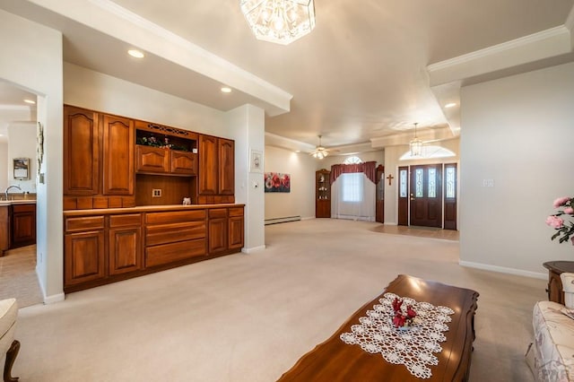 living area featuring a baseboard radiator, recessed lighting, ceiling fan with notable chandelier, light colored carpet, and baseboards