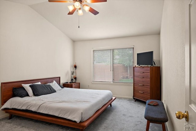 4315 Outlook Blvd Unit L, Pueblo, CO 81008 - bedroom with vaulted ceiling, carpet, a ceiling fan, and baseboards