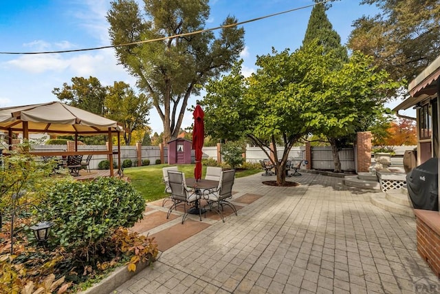 326 W Pitkin Ave, Pueblo, CO 81004 - view of patio / terrace featuring outdoor dining space and a gazebo