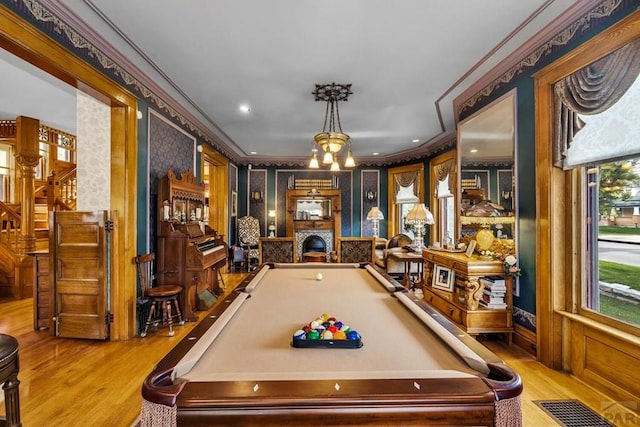 326 W Pitkin Ave, Pueblo, CO 81004 - playroom with crown molding, wood finished floors, billiards table, a chandelier, and recessed lighting