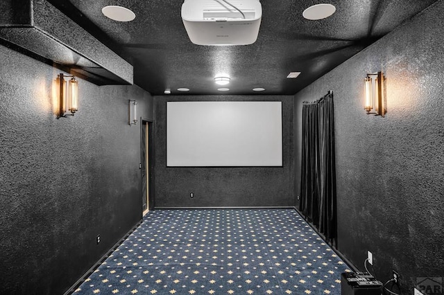 368 S Camino De Los Ranchos, Pueblo West, CO 81007 - carpeted home theater with a textured wall and a textured ceiling