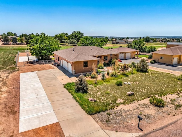 368 S Camino De Los Ranchos, Pueblo West, CO 81007 - view of front of property with a garage and driveway