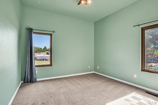 368 S Camino De Los Ranchos, Pueblo West, CO 81007 - carpeted empty room with baseboards and ceiling fan