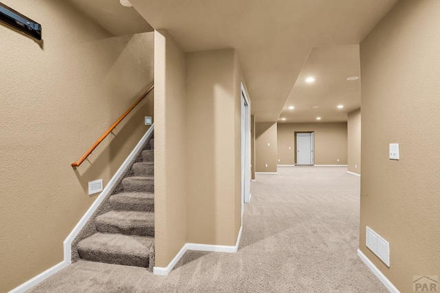 368 S Camino De Los Ranchos, Pueblo West, CO 81007 - stairway with carpet, recessed lighting, and a textured wall