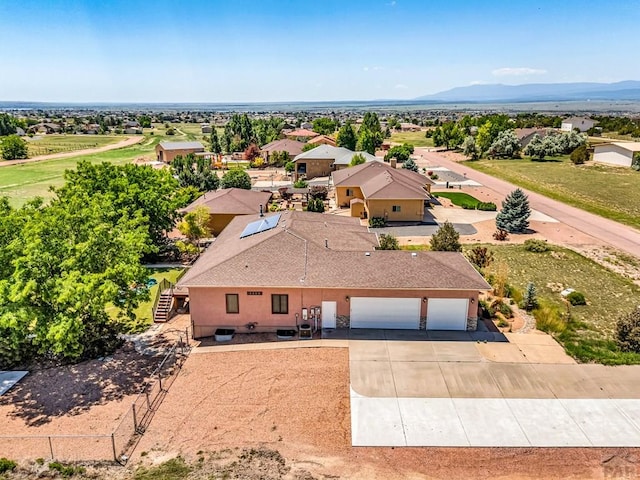 368 S Camino De Los Ranchos, Pueblo West, CO 81007 - aerial view of property and surrounding area featuring a mountain backdrop