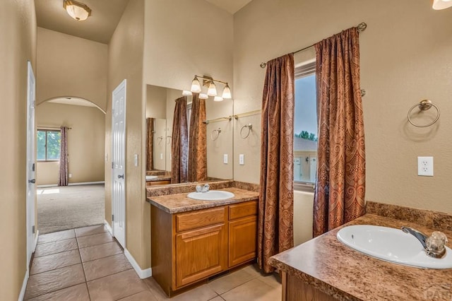368 S Camino De Los Ranchos, Pueblo West, CO 81007 - bathroom featuring two vanities and tile patterned floors