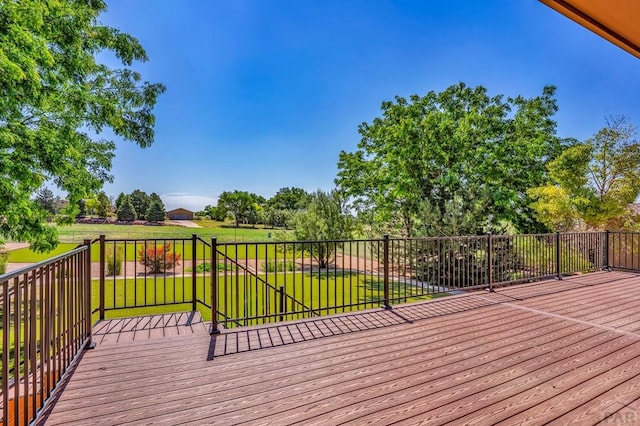 368 S Camino De Los Ranchos, Pueblo West, CO 81007 - wooden deck featuring a lawn