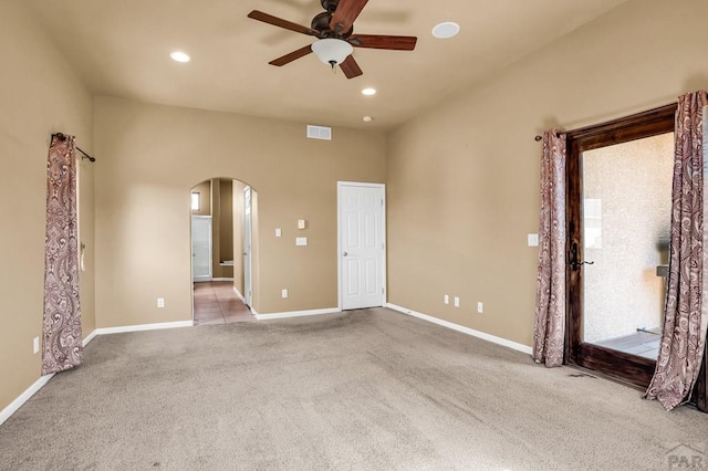 368 S Camino De Los Ranchos, Pueblo West, CO 81007 - carpeted spare room with arched walkways, ceiling fan, and recessed lighting