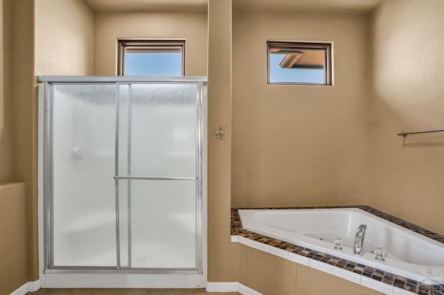 368 S Camino De Los Ranchos, Pueblo West, CO 81007 - full bath with a shower stall and a garden tub