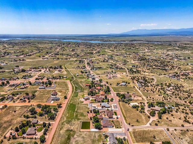 368 S Camino De Los Ranchos, Pueblo West, CO 81007 - aerial overview of property's location featuring a mountainous background