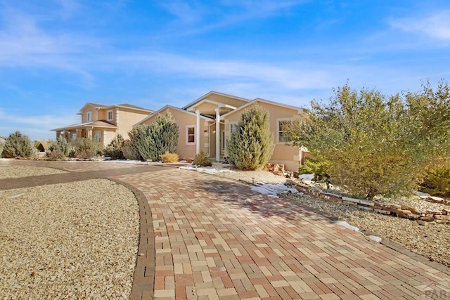 view of front facade featuring stucco siding