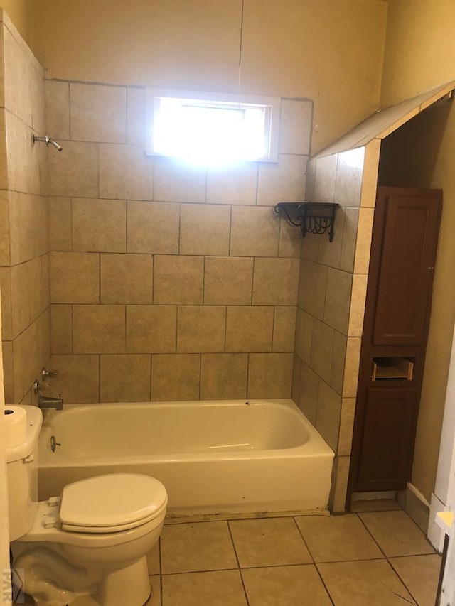 1905 E Evans Ave, Pueblo, CO 81004 - full bath with tile patterned floors, toilet, and shower / tub combination