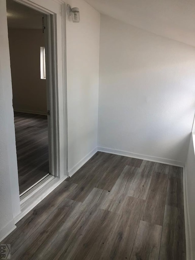 1905 E Evans Ave, Pueblo, CO 81004 - empty room with dark wood-style floors and baseboards