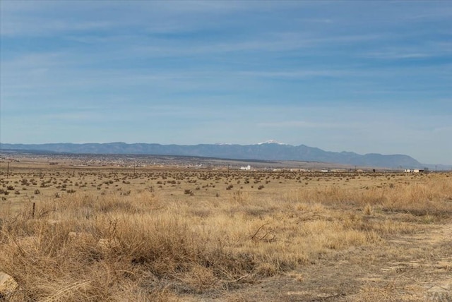 property view of mountains featuring a rural view