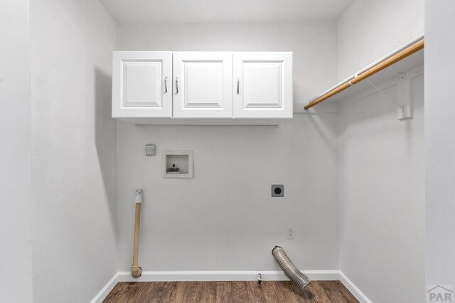 laundry room featuring hookup for a washing machine, cabinet space, dark wood finished floors, and hookup for an electric dryer