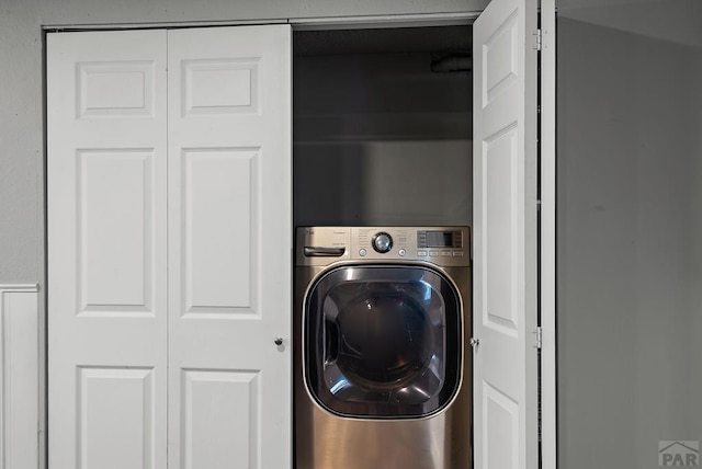 washroom featuring laundry area and washer / clothes dryer