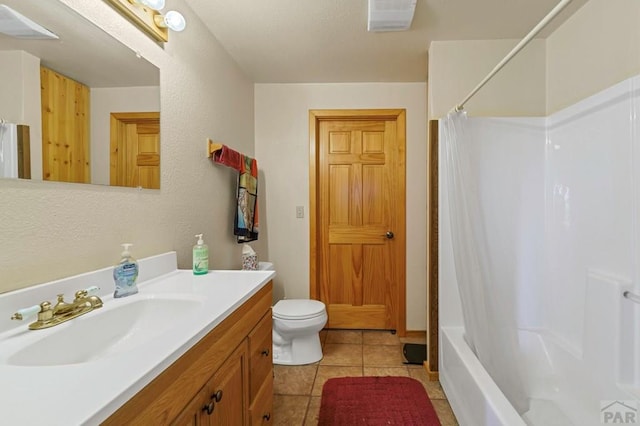 bathroom featuring visible vents, shower / tub combo, vanity, tile patterned floors, and toilet