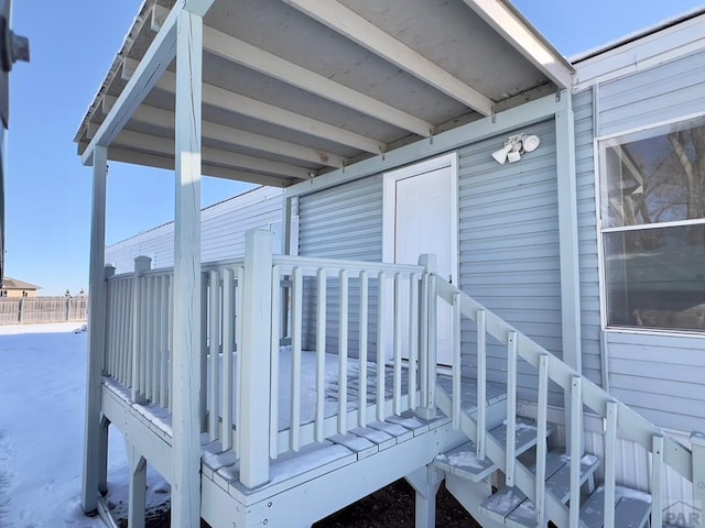 view of snow covered deck