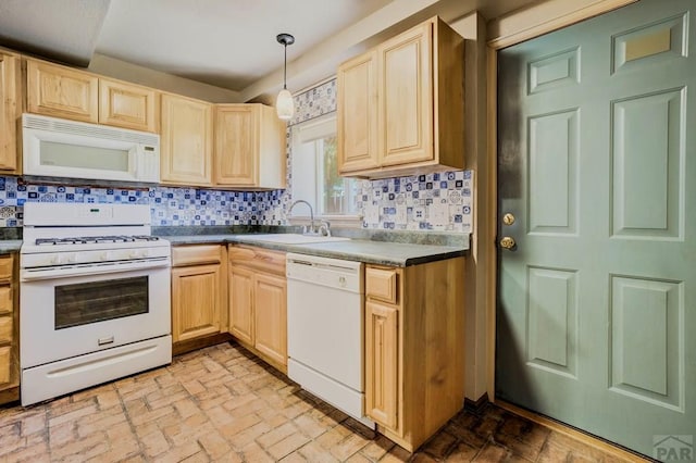 kitchen with light brown cabinetry, a sink, decorative backsplash, and white appliances
