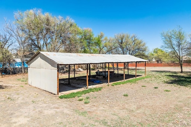 view of outdoor structure featuring a detached carport